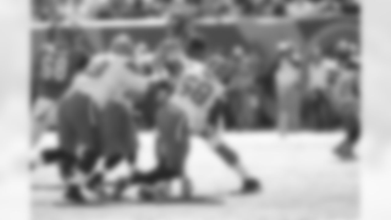 LB Christian Kirksey (58) sacks Bengals QB Andy Dalton in the first half.