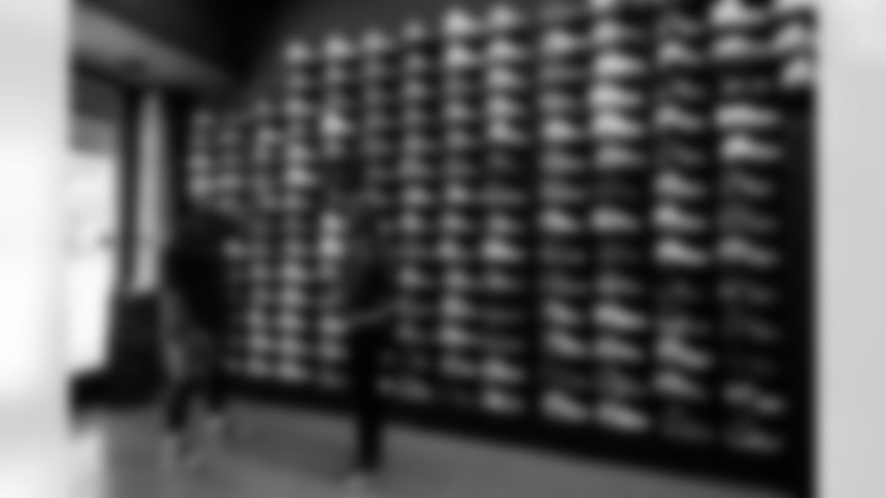 TAMPA, FL - May 03, 2022 - Team Reporter Casey Phillips and Running Back Giovani Bernard #25 of the Tampa Bay Buccaneers during an episode of The Bay at Soleciety Sneaker Boutique. Photo By Kyle Zedaker/Tampa Bay Buccaneers