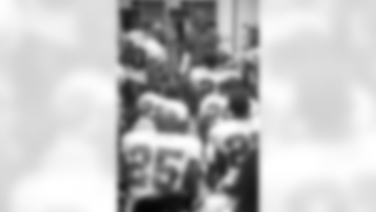 Head Coach Raheem Morris of the Tampa Bay Buccaneers addresses his team in the locker room prior to kickoff against the Jacksonville Jaguars in Jacksonville, Florida on August 22, 2009.