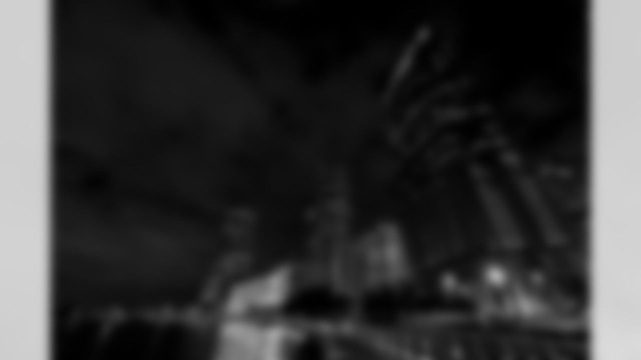 TAMPA, FL - January 13, 2023 - The Tampa Riverwalk and Truist building are lit red in support of the Bucs making the 2022 Playoffs. Photo By Kyle Zedaker/Tampa Bay Buccaneers
