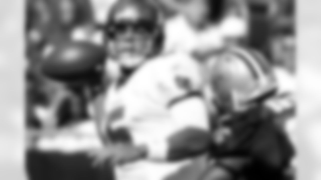 5 QB Josh Freeman fires the ball off under pressure