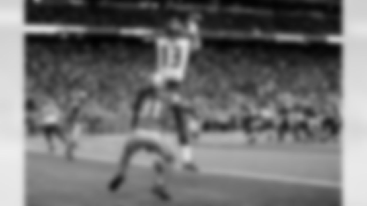 DETROIT, MI - DECEMBER 7: Wide Receiver Mike Evans #13 of the Tampa Bay Buccaneers catches a touchdown during the game against the Detroit Lions at Ford Field on December 7, 2014, in Detroit, Michigan. The Buccaneers lost 34-17. (photo by Matt May/Tampa Bay Buccaneers)