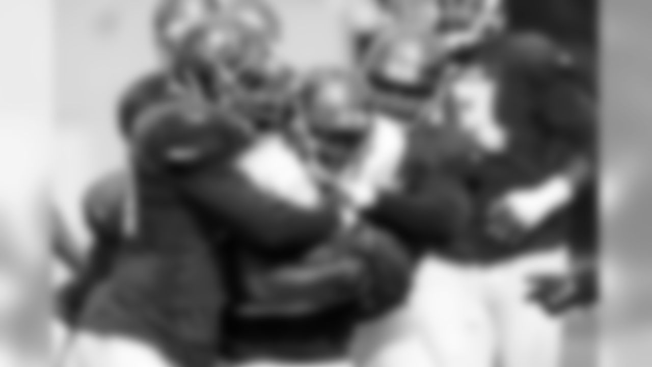 44 RB Russell Hansbrough and #98 DT Clinton McDonald