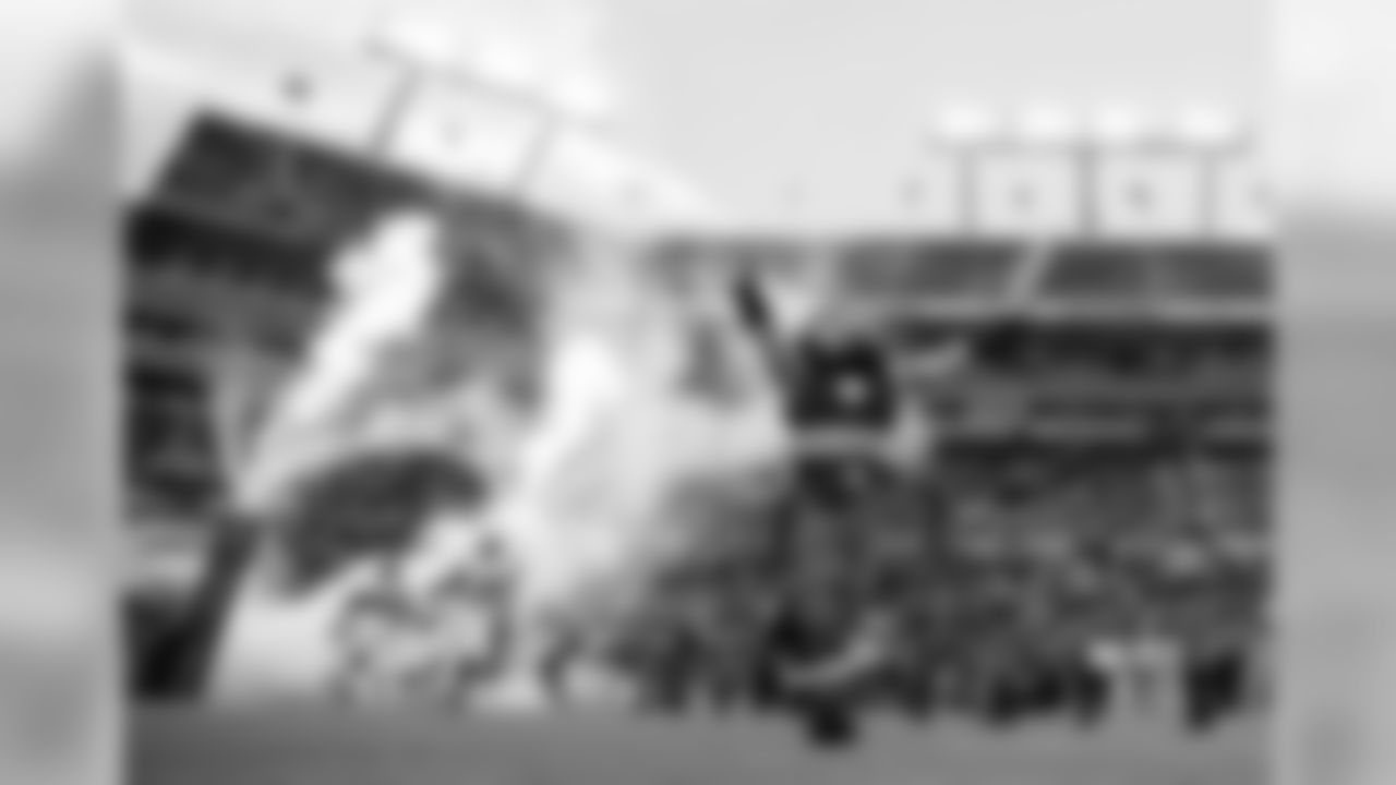 Captain Fear leads the Buccaneers onto the field through the tunnel as they prepare to face the Baltimore Ravens in a preseason game.