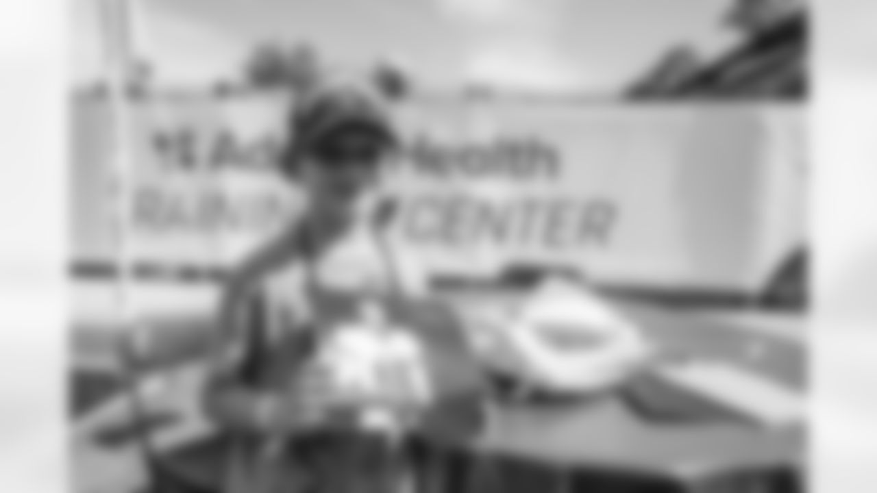 TAMPA, FL - August 06, 2021 - A young fan during Community Impact day after 2021 Training Camp practice at AdventHealth Training Center. Photo By Kyle Zedaker/Tampa Bay Buccaneers