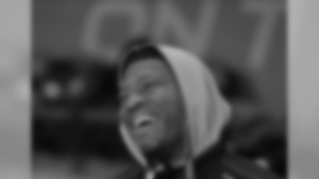 Florida State quarterback Jameis Winston smiles before stretching at the NFL football scouting combine in Indianapolis, Saturday, Feb. 21, 2015. (AP Photo/David J. Phillip)