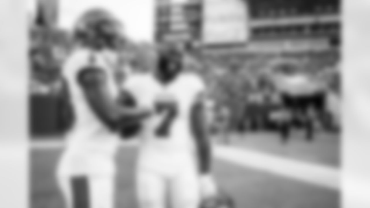 TAMPA, FL - August 13, 2022 - Wide Receiver Tyler Johnson #18 and Running Back Leonard Fournette #7 of the Tampa Bay Buccaneers before the preseason game between the Miami Dolphins and Tampa Bay Buccaneers at Raymond James Stadium. The Buccaneers lost the game, 26-24. Photo By Tori Richman/Tampa Bay Buccaneers