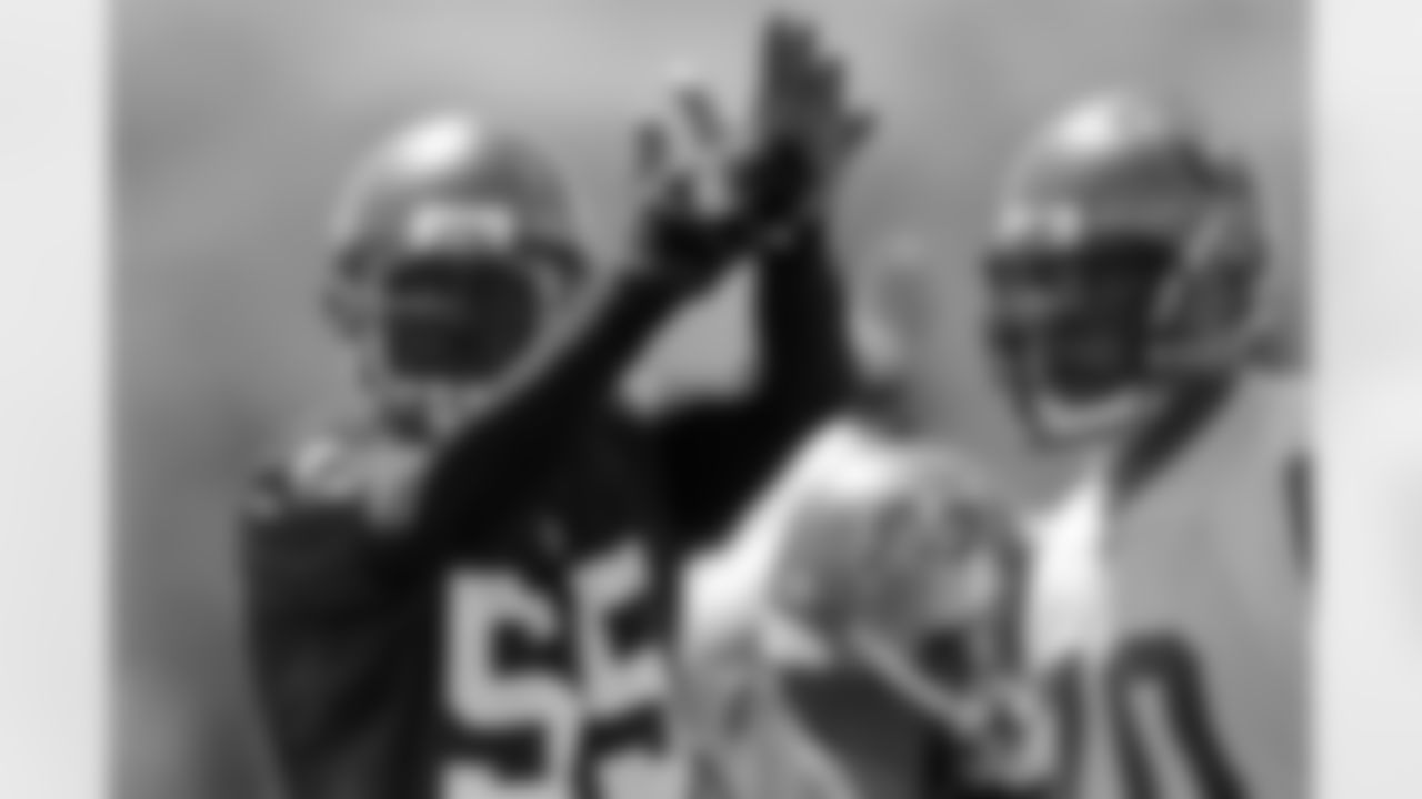 LB Derrick Brooks signals for a timeout