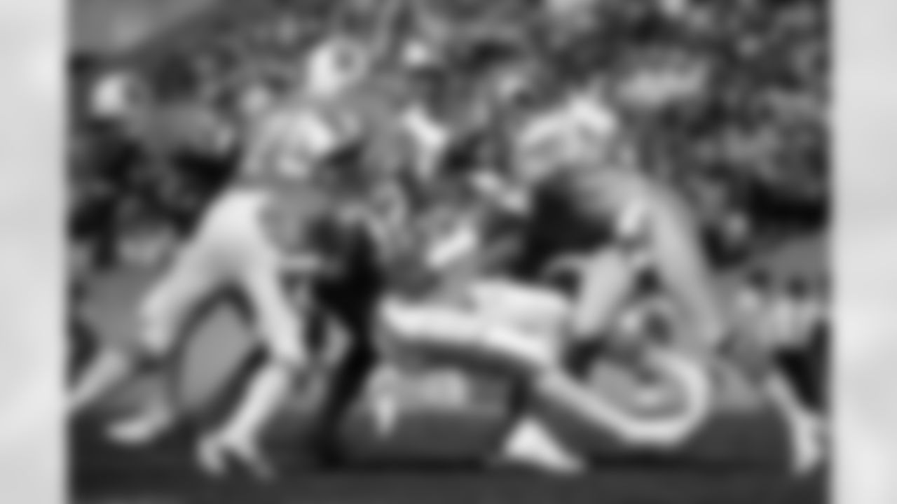 Game 1: Fullback James Wilder (#32) runs with the ball as the Bucs lose to the Detroit Lions 11-0 at Tampa Stadium. (9/4/1983)...