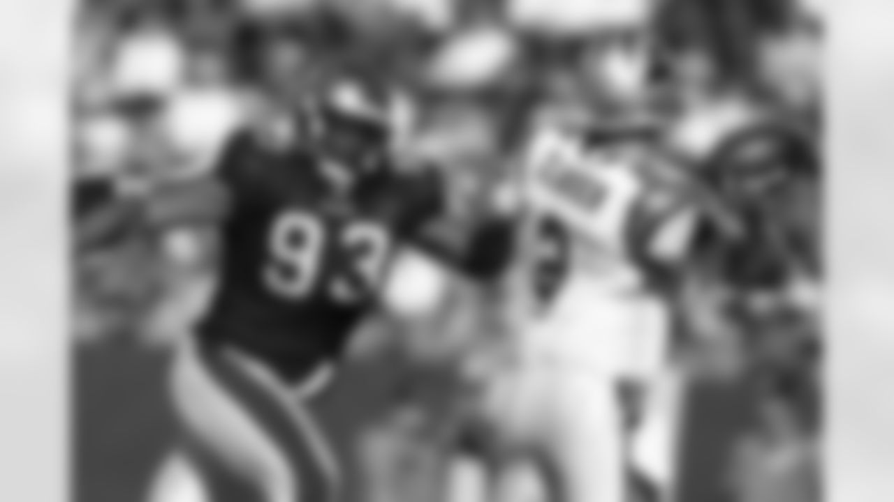 93 DT Gerald McCoy breaks through the line and gets after the quarterback