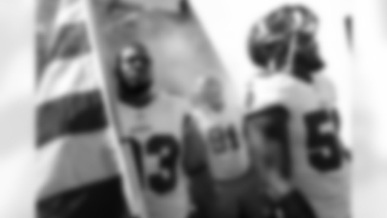 DT Gerald McCoy and LB Dekoda Watson wait for team intros