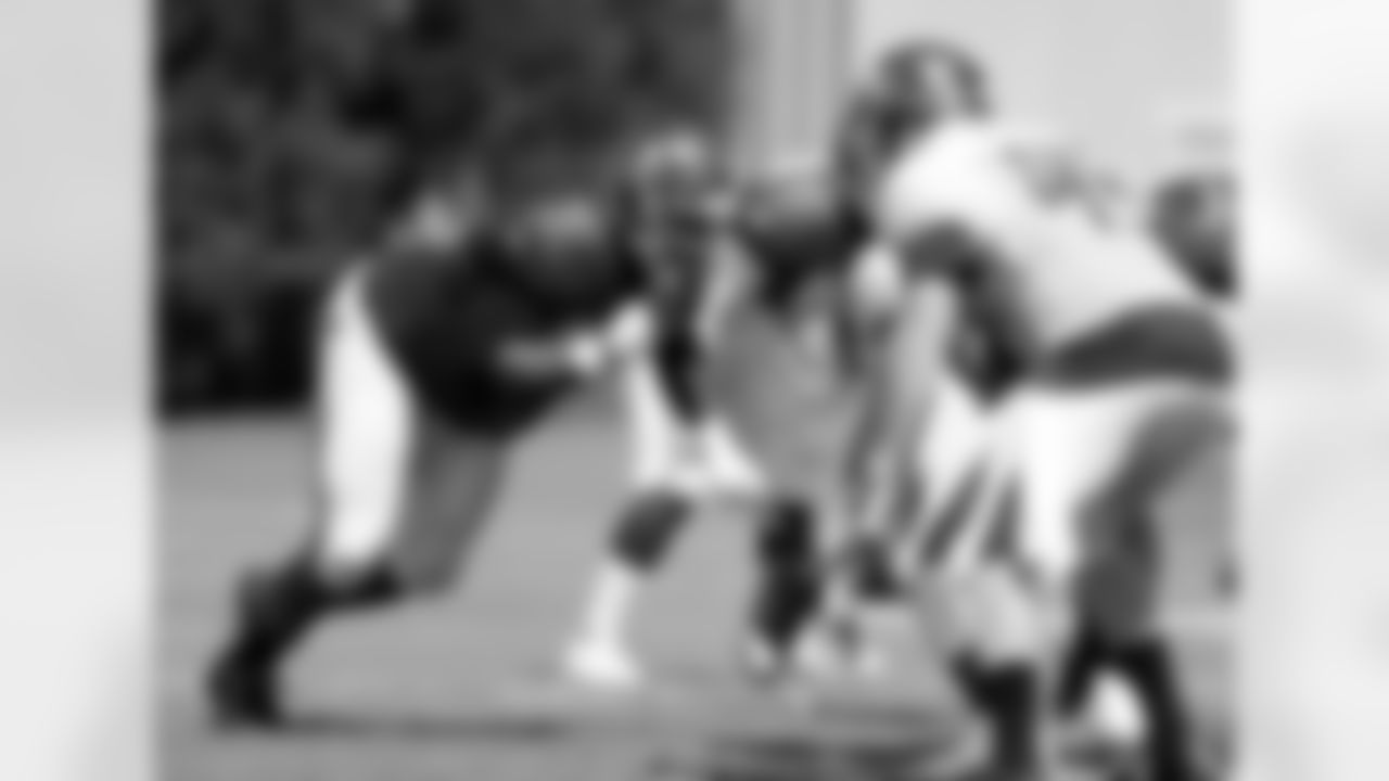 93 DT Gerald McCoy and #45 TE Alan Cross