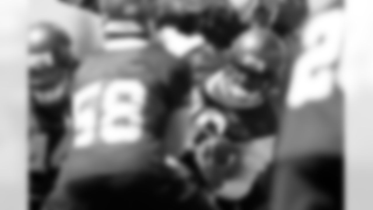 Practice squad RB Kenneth Darby looks for any way through a crowded line of scrimmage