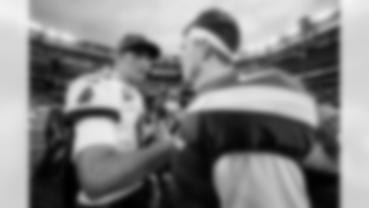 EAST RUTHERFORD, NJ - January 02, 2022 - Quarterback Tom Brady #12 of the Tampa Bay Buccaneers and Zach Wilson after the game between the Tampa Bay Buccaneers and New York Jets at MetLife Stadium. The Buccaneers won the game, 28-24. Photo By Kyle Zedaker/Tampa Bay Buccaneers