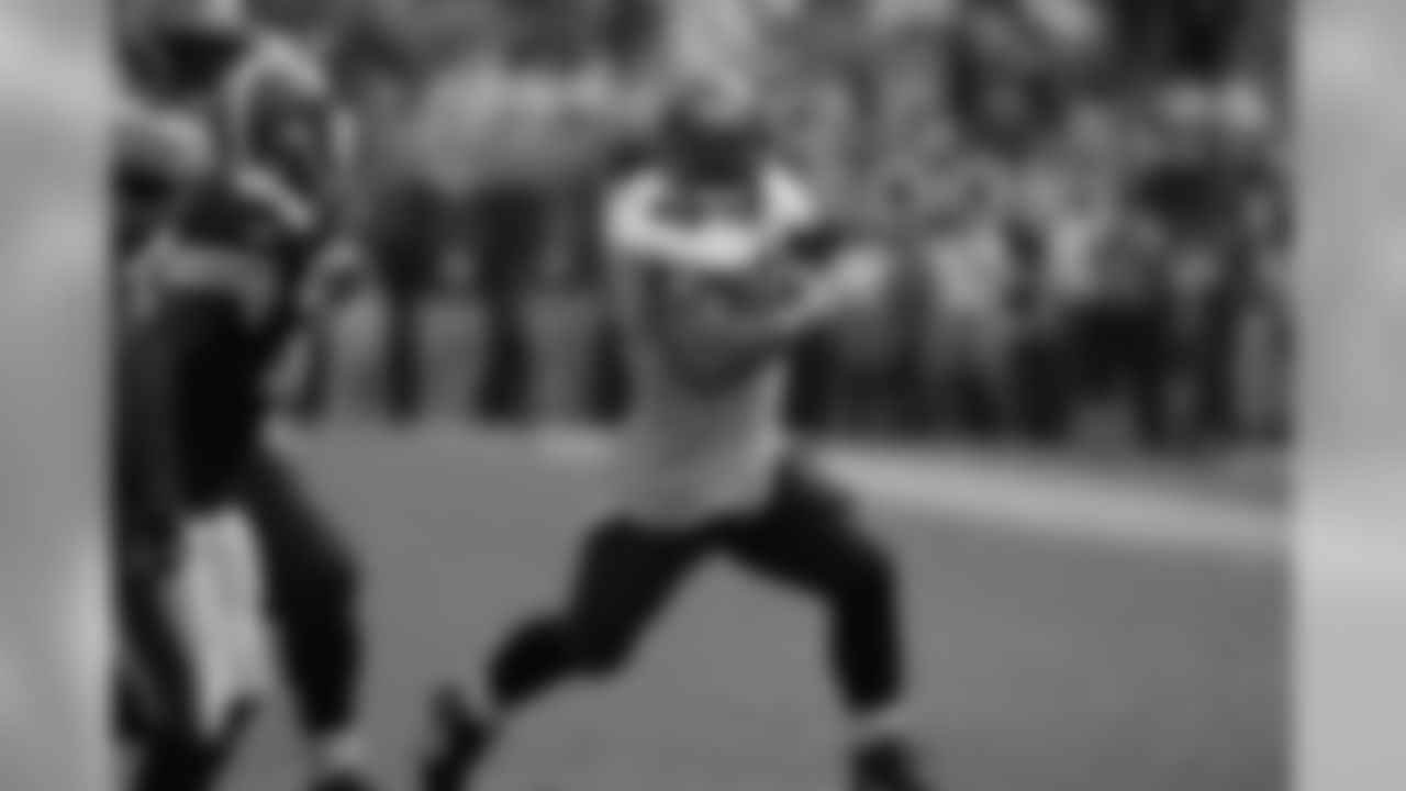 October 13, 2002 - Mike Alstott takes the handoff and runs around, over and through nine defenders against the Cleveland Browns.