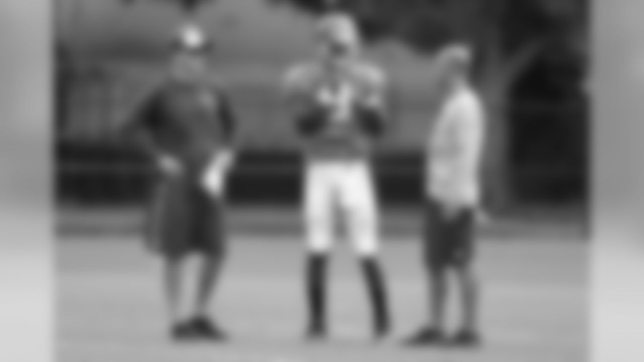 Offensive Coordinator Dirk Koetter, Jameis Winston and Quarterbacks Coach Mike Bajakian at practice on Wednesday.