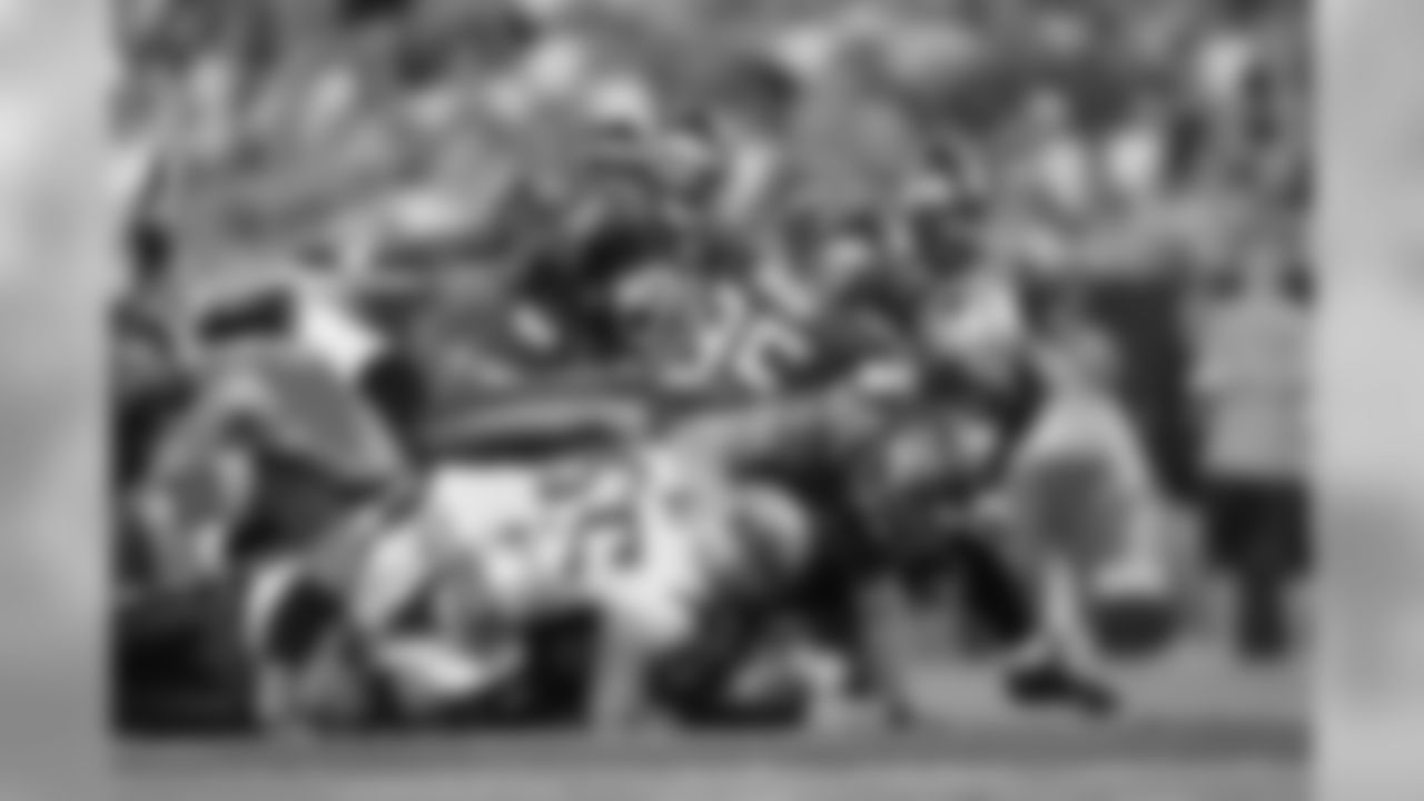 Linebacker Barrett Ruud attempts an interception.