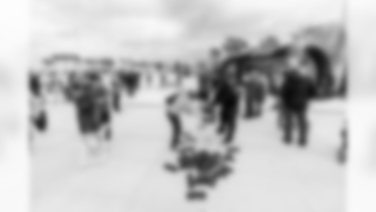 TAMPA, FL - January 13, 2023 - Fans participate in a Raise the Flags Friday event at St. Pete Pier prior to the start of the 2022 Playoffs. Photo By Kyle Zedaker/Tampa Bay Buccaneers
