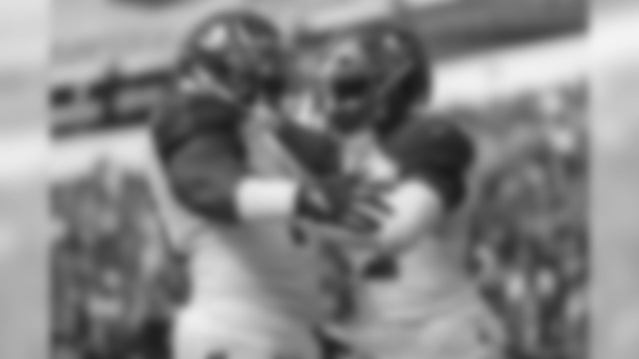 RB T.J. Logan, No. 22 & RB Peyton Barber, No. 25
