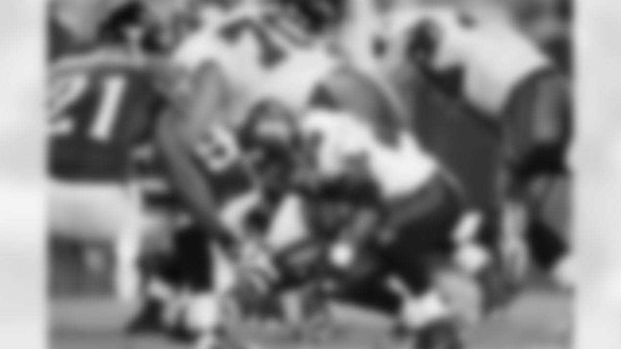 28 RB Warrick Dunn recovers his own fumble