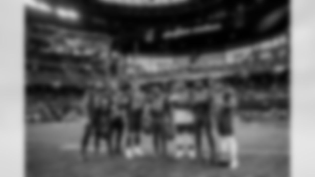 LAS VEGAS, NV - FEBRUARY 06, 2022 - Wide Receiver Mike Evans #13, Guard Ali Marpet #74, Center Ryan Jensen #66, Inside Linebacker Devin White #45, Defensive Tackle Vita Vea #50, Outside Linebacker Shaquil Barrett #58 and Safety Antoine Winfield Jr. #31 of the Tampa Bay Buccaneers after the 2022 Pro Bowl at Allegiant Stadium. The AFC won the game 41-35. Photo By Tori Richman/Tampa Bay Buccaneers