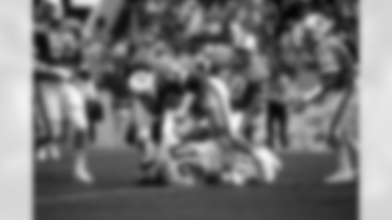 TAMPA, FL - SEPTEMBER 4: Linebacker Jeff Davis #58, Cornerback Mike Washington #40, Defensive end Lee Roy Selmon #63 and Defensive tackle Brad White #90 of the Tampa Bay Buccaneers in action against the Detroit Lions at Tampa Stadium on September 4, 1983 in Tampa, Florida. The Buccaneers lost 0-11. (photo by Allen's Studio/Tampa Bay Buccaneers)