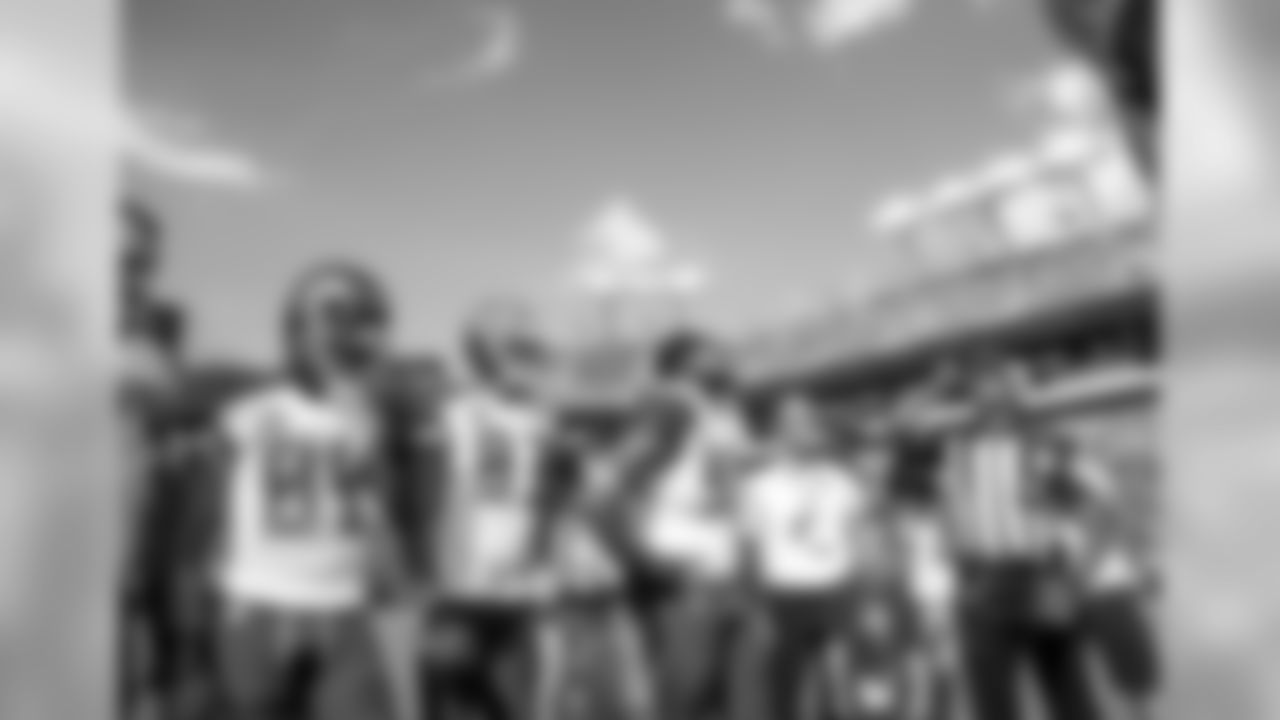 89 WR Russell Shepard, #83 WR Vincent Jackson, and #93 DT Gerald McCoy