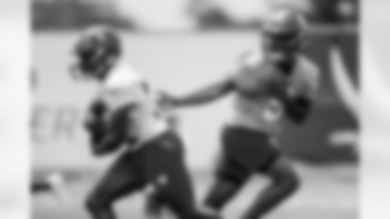 TAMPA, FL - May 12, 2023 - Running Back Ikechukwu Irabor #37 and Quarterback Kaylan Wiggins #9 of the Tampa Bay Buccaneers during 2023 Rookie Mini Camp at AdventHealth Training Center. Photo By Tori Richman/Tampa Bay Buccaneers