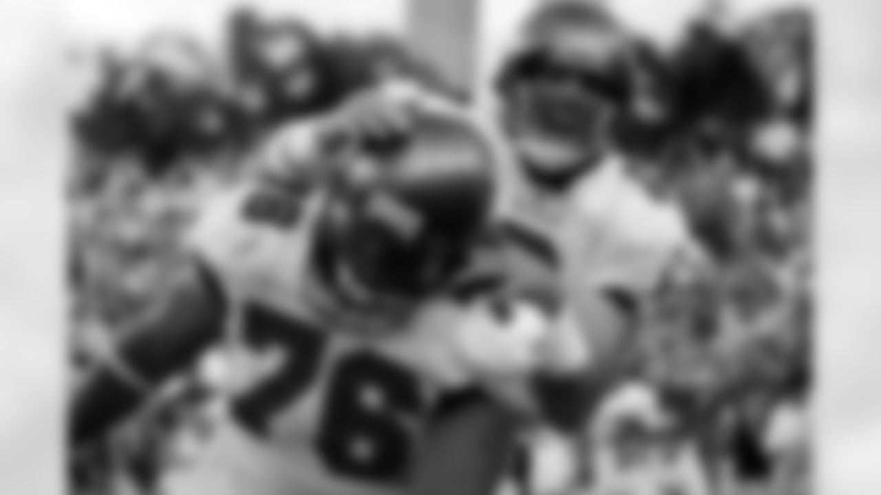 8 QB Brian Griese and #76 Jeremy Zuttah celebrate the touchdown made by Earnest Graham