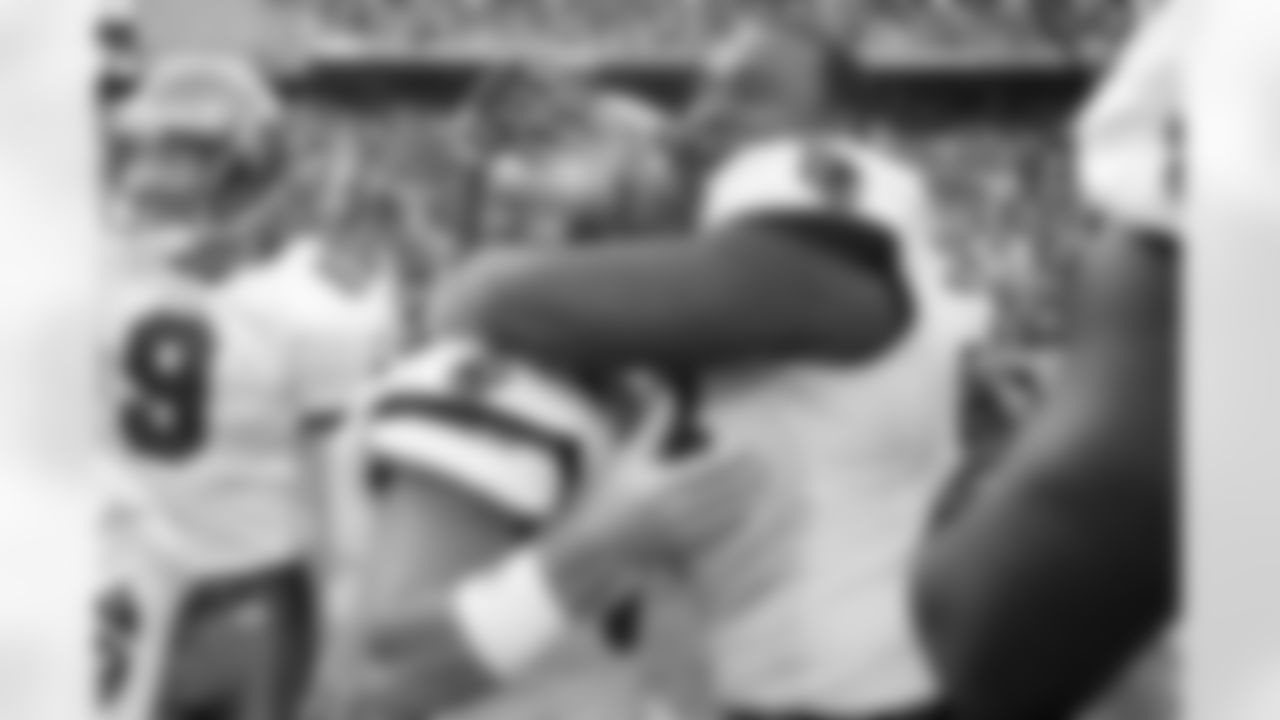 3 K Matt Bryant gets a warm reception from team mates after a game winning field goal in overtime
