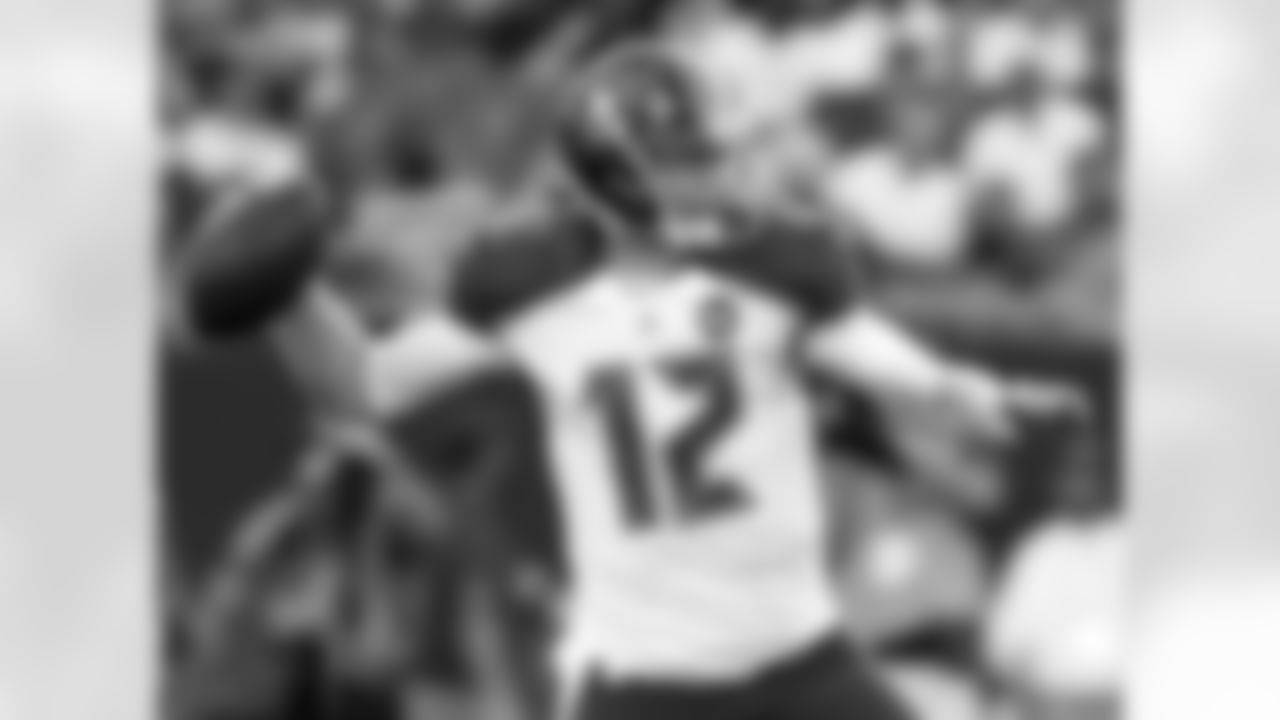 Tampa Bay Buccaneers quarterback Josh McCown throws a pass against the Miami Dolphins during the first quarter of an NFL preseason football game Saturday, Aug. 16, 2014, in Tampa, Fla. (AP Photo/Brian Blanco)