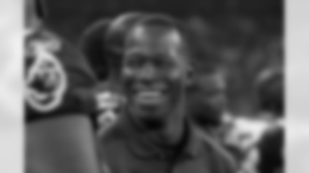 Head Coach Raheem Morris of the Tampa Bay Buccaneers smiles on the sideline against the New England Patriots at Wembley Stadium in London, England on October 25, 2009.