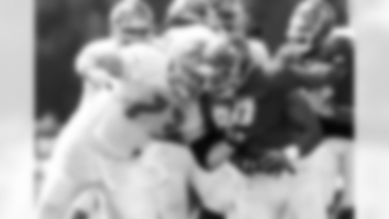 T Martin Wallace, DT Henry Melton