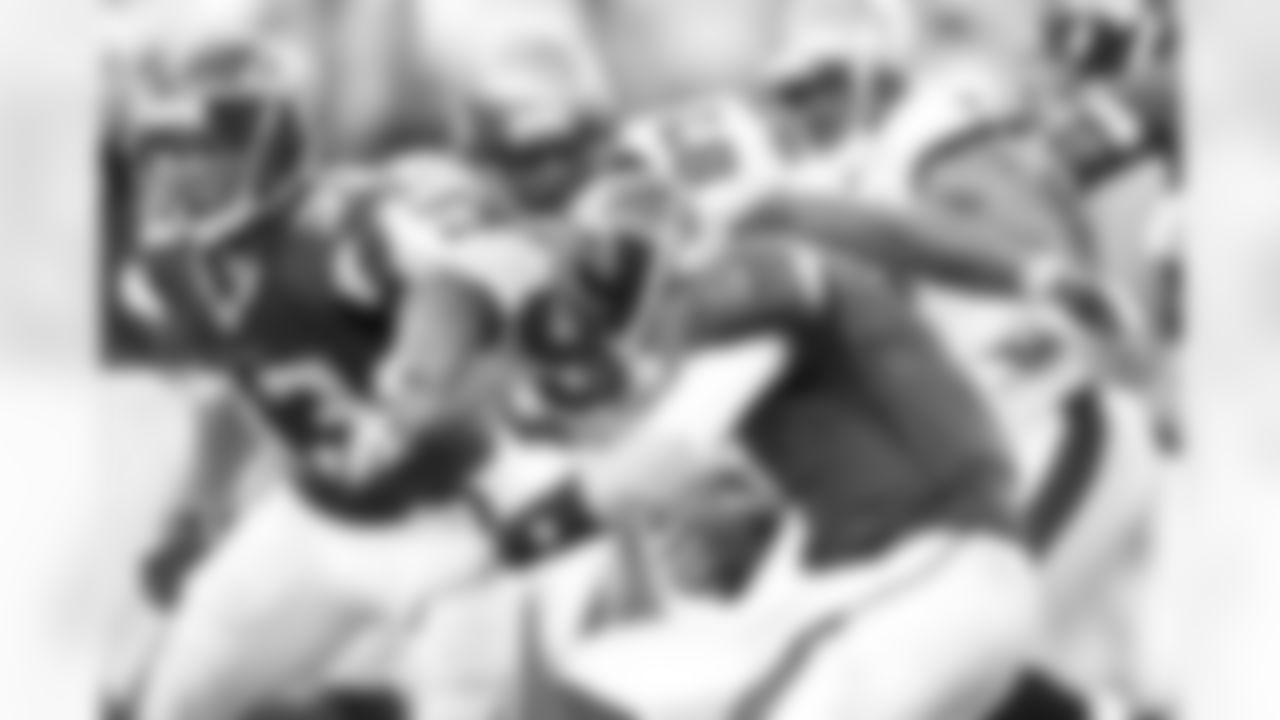 97 DE/DT Jimmy Wilkerson charges in for a sack