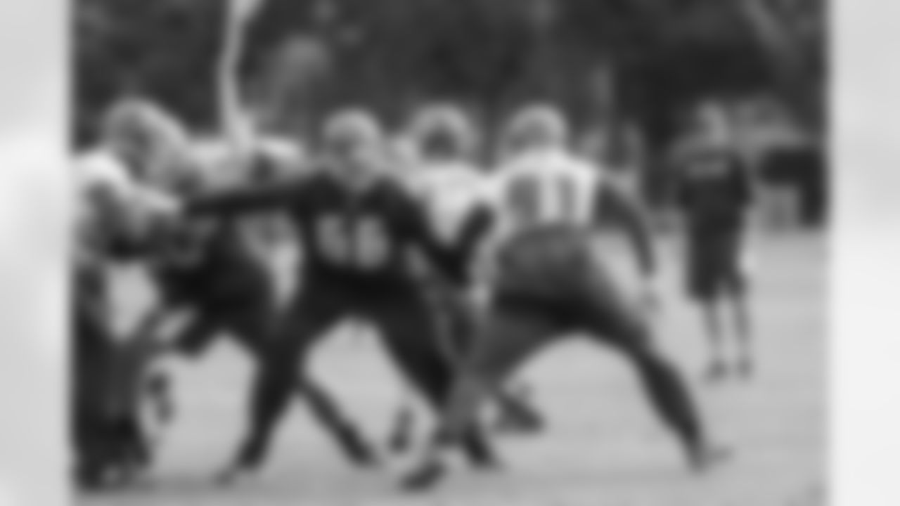 66 OT Leonard Wester and #91 DE Robert Ayers