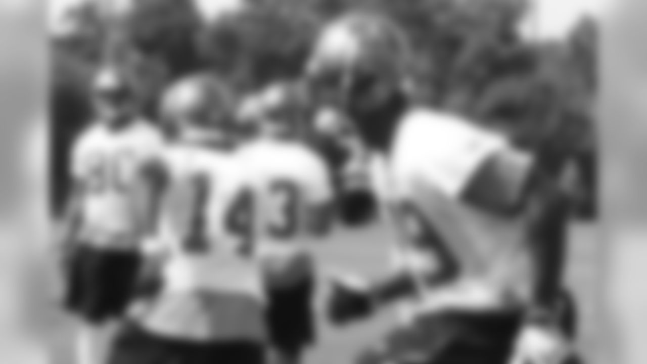 WR Antonio Bryant and his fellow pass-catchers run through a footwork drill