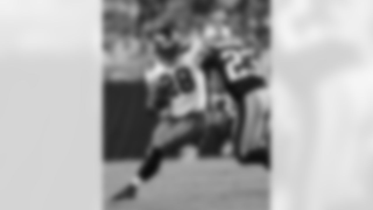 RB Lionel Gates moves the ball four yards in the third quarter