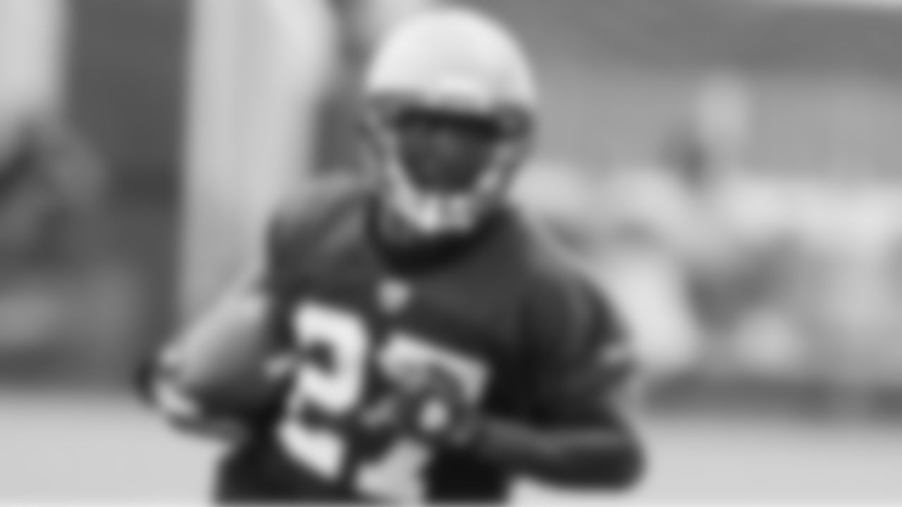 CB Torrie Cox picked off a pass during the first full-team period of practice
