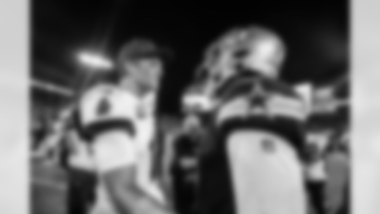 TAMPA, FL - September 09, 2021 - Quarterback Tom Brady #12 of the Tampa Bay Buccaneers and Dak Prescott after the game between the Dallas Cowboys and Tampa Bay Buccaneers at Raymond James Stadium. The Buccaneers won the game, 31-29. Photo By Kyle Zedaker/Tampa Bay Buccaneers
