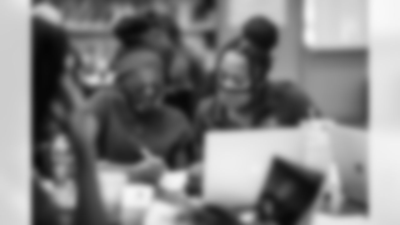 TAMPA, FL - OCTOBER 18, 2021 - Students at Young Middle School work with their mentors during the Tampa Bay Buccaneers Youth Leadership program. Photo By Tori Richman/Tampa Bay Buccaneers