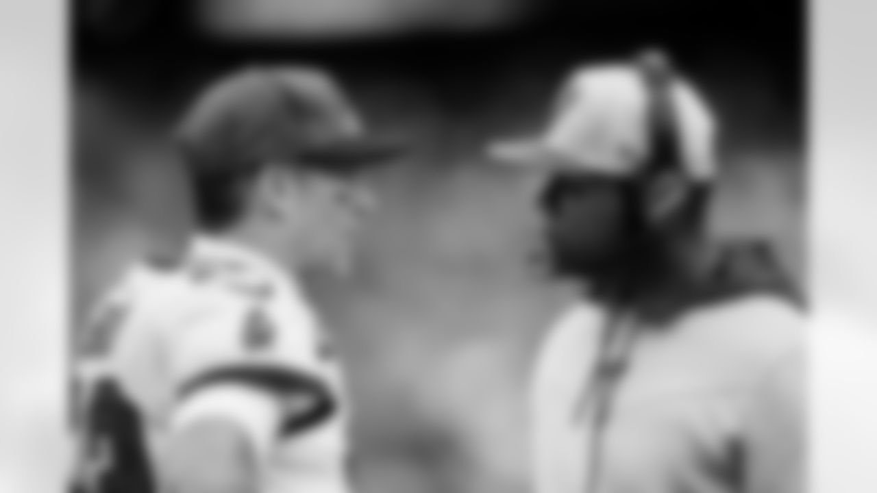 EAST RUTHERFORD, NJ - January 02, 2022 - Quarterback Tom Brady #12 and Offensive Coordinator Byron Leftwich of the Tampa Bay Buccaneers during the game between the Tampa Bay Buccaneers and New York Jets at MetLife Stadium. The Buccaneers won the game, 28-24. Photo By Kyle Zedaker/Tampa Bay Buccaneers