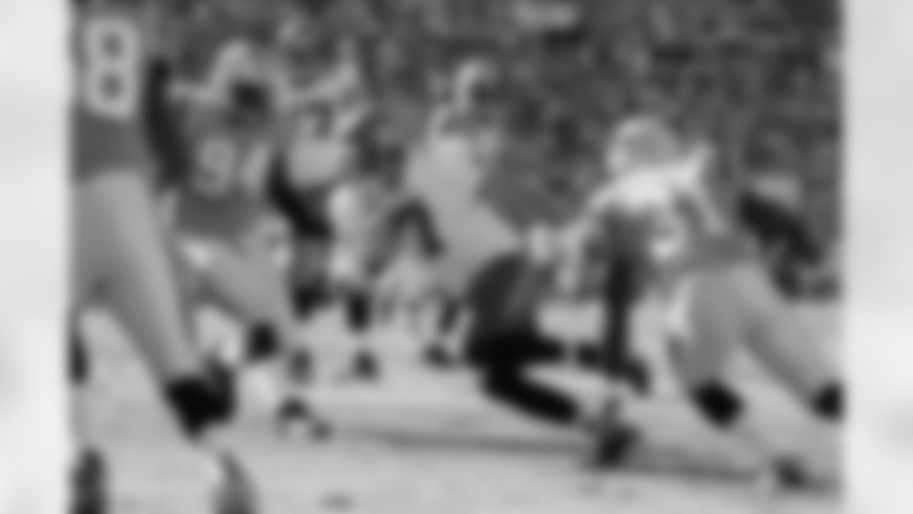 7 Jeff Garcia takes the ball three yards for the first touchdown of the game