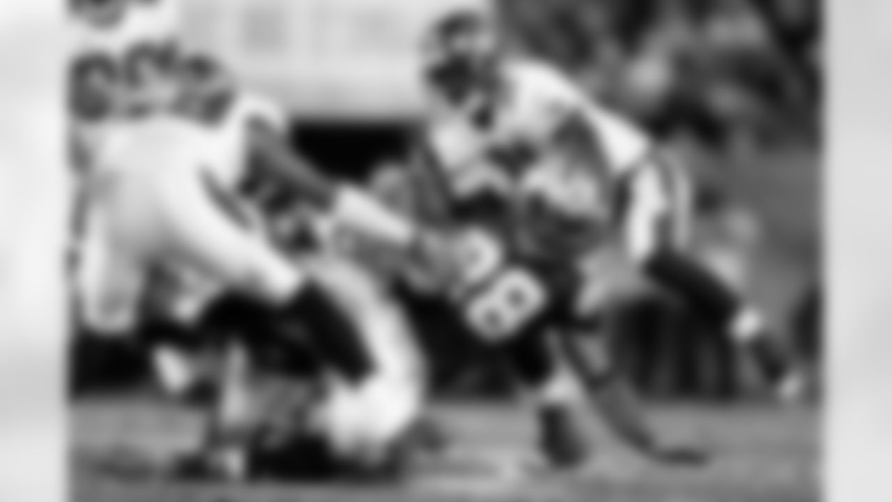 31 CB Phillip Buchanon assist on stopping the run