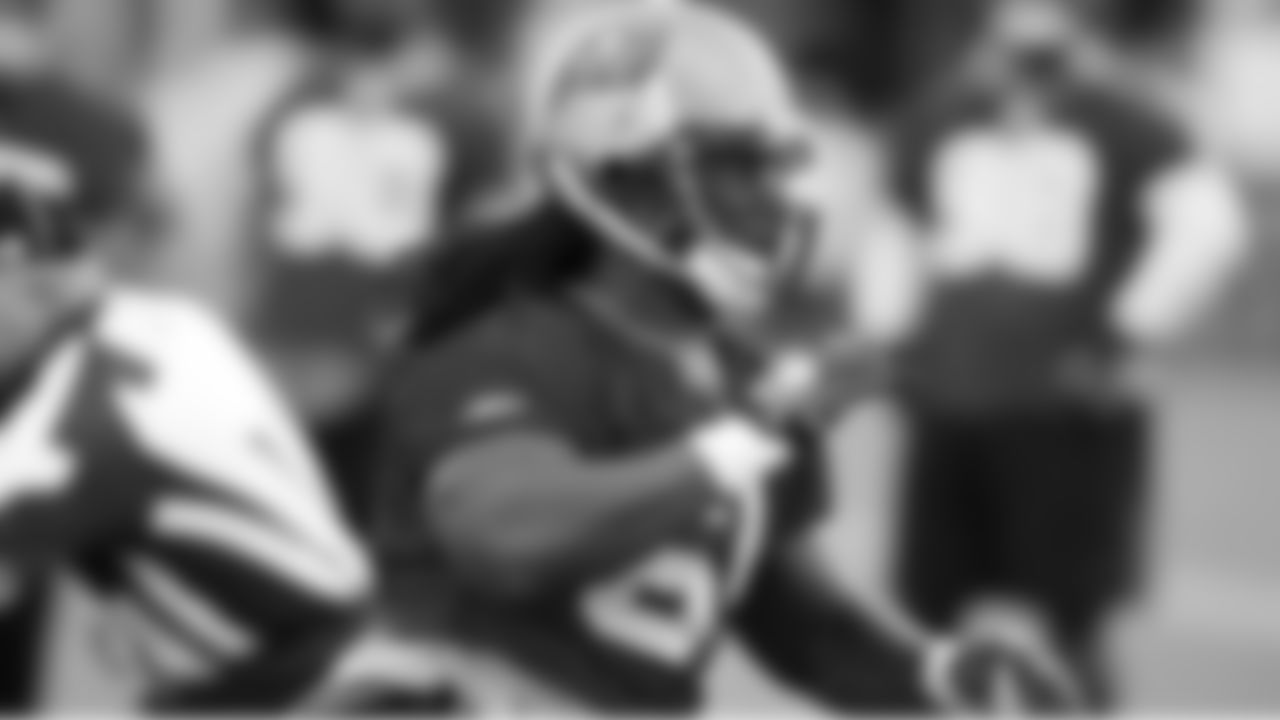 DE Jarriett Buie makes a quick move toward the offensive backfield
