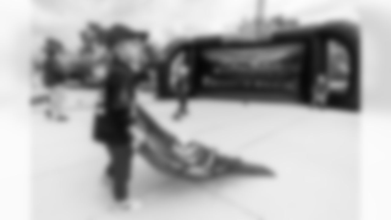 TAMPA, FL - January 13, 2023 - Fans participate in a Raise the Flags Friday event at St. Pete Pier prior to the start of the 2022 Playoffs. Photo By Kyle Zedaker/Tampa Bay Buccaneers