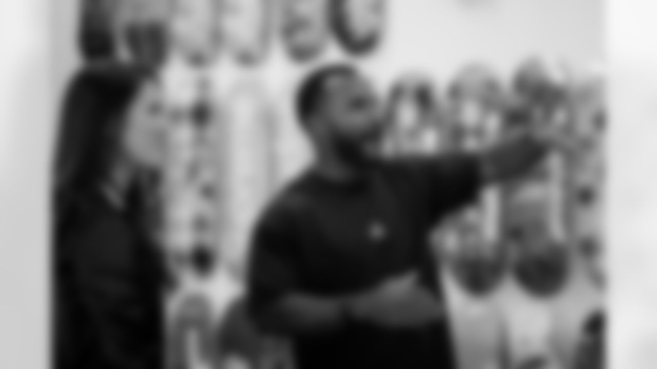 TAMPA, FL - May 03, 2022 - Team Reporter Casey Phillips and Running Back Giovani Bernard #25 of the Tampa Bay Buccaneers during an episode of The Bay at Soleciety Sneaker Boutique. Photo By Kyle Zedaker/Tampa Bay Buccaneers