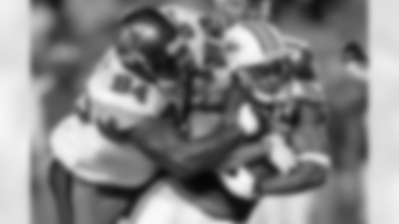 WR Marques Douglas envelops RB Patrick Cobbs