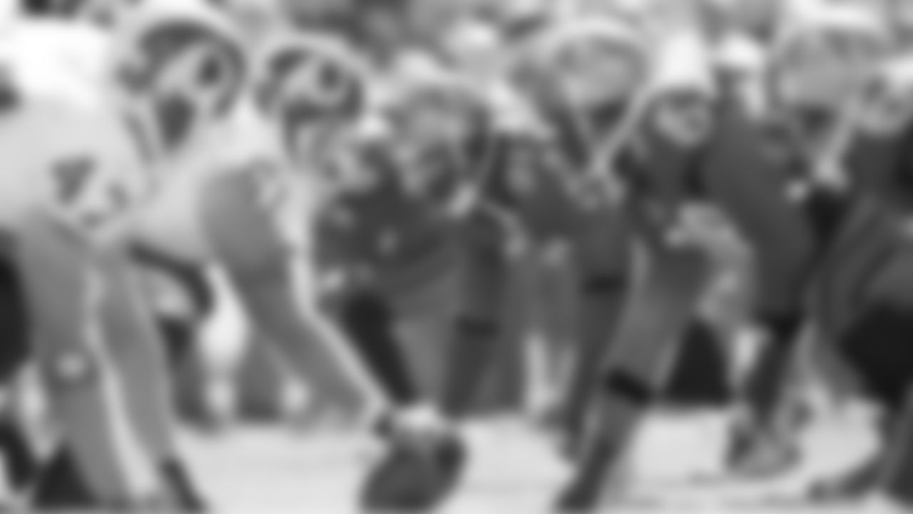 91 DE Stylez G. White is poised to blast off the line of scrimage