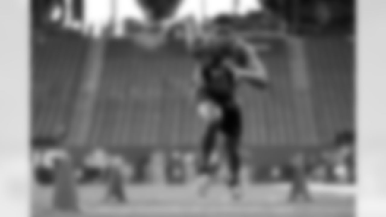 Florida State quarterback Jameis Winston runs a drill at the NFL football scouting combine in Indianapolis, Saturday, Feb. 21, 2015. (AP Photo/Julio Cortez)