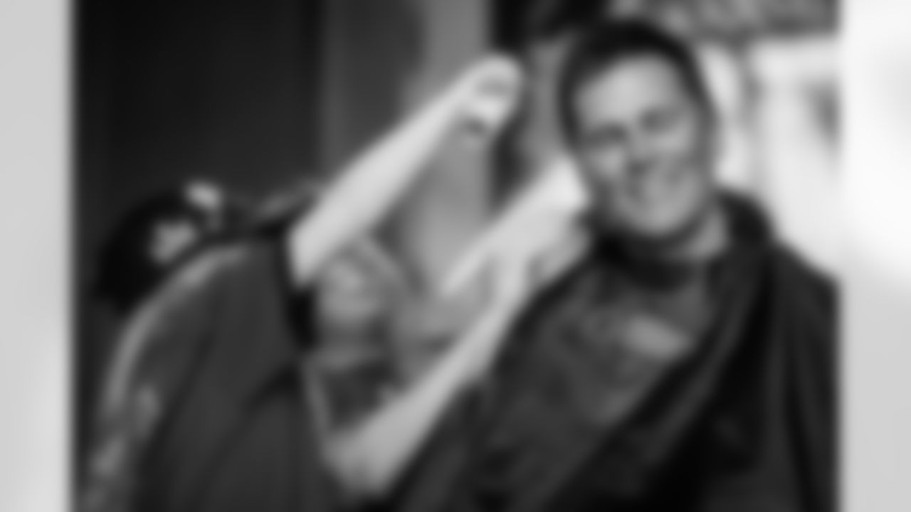 TAMPA, FL - June 08, 2022 - Quarterback Tom Brady #12 of the Tampa Bay Buccaneers has his hair colored during the 8th annual Cut/Color for a Cure at AdventHealth Training Center. Photo By Kyle Zedaker/Tampa Bay Buccaneers